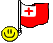 a flag and a smiley face on a black background