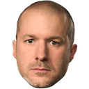 a man with a bald head wearing a suit and tie