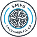 a white and blue logo with the words smf sacramento