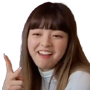 a girl with long hair giving a thumbs up