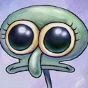 a green cartoon character with big eyes