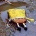 a yellow object floating on top of a body of water