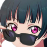 a girl with pink eyes holding a cell phone
