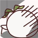 a white object with a green leaf on top of it