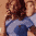 a blurry photo of a woman in a blue shirt