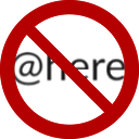 a red and white sign with the word @ here on it