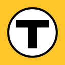 a black and white letter t in a circle