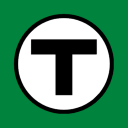 a black and white letter t in a circle