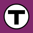 a black and white letter t in a circle