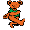 a picture of a teddy bear with a scarf around its neck