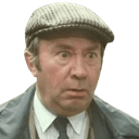 a man in a suit and tie wearing a hat