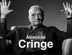 a man sitting in a chair with his hands up