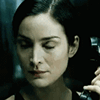 a woman holding a cell phone up to her ear