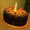 a chocolate cake with candles on top of it
