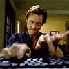 a man sitting at a desk with a keyboard