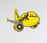 a yellow airplane flying in the sky