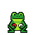 a frog sitting on top of a green surface
