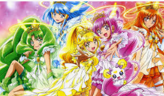 a group of anime girls standing next to each other