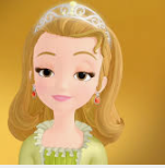 a girl in a green dress with a tiara