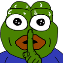 a green frog making a face with his finger