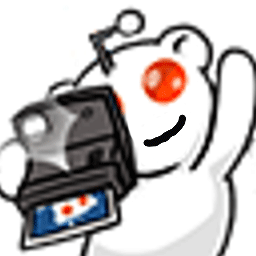 a polar bear holding a camera in its right hand