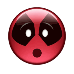 a red button with a black and white face