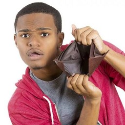 a young man is holding a brown paper origami