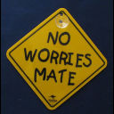 a yellow sign that says no worries mate