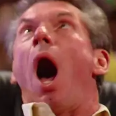 a man with his mouth open and his tongue out