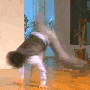 a blurry image of a person doing a handstand