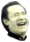 a black and white photo of a smiling man