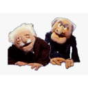 a couple of puppets sitting next to each other