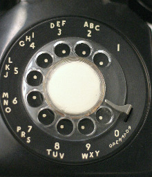 a close up of an old fashioned telephone