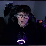 a man wearing headphones and a black jacket