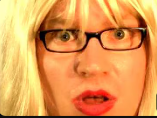 a woman with glasses making a surprised face
